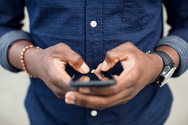 Man using his cell phone. 