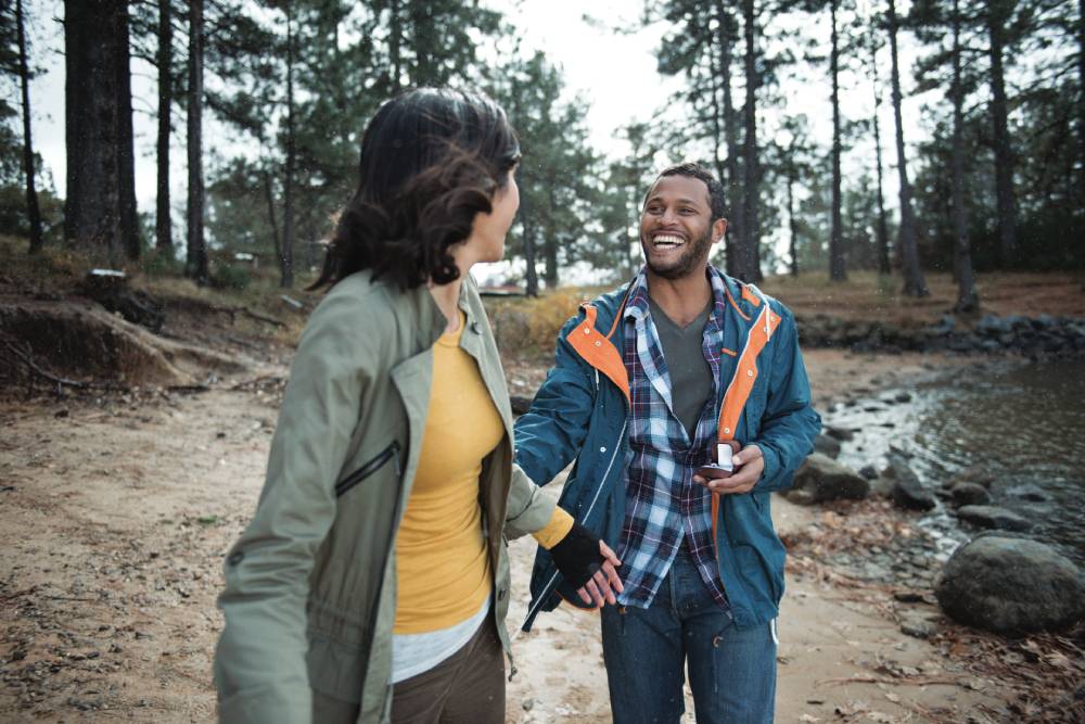 Woman and man hiking in the fall.